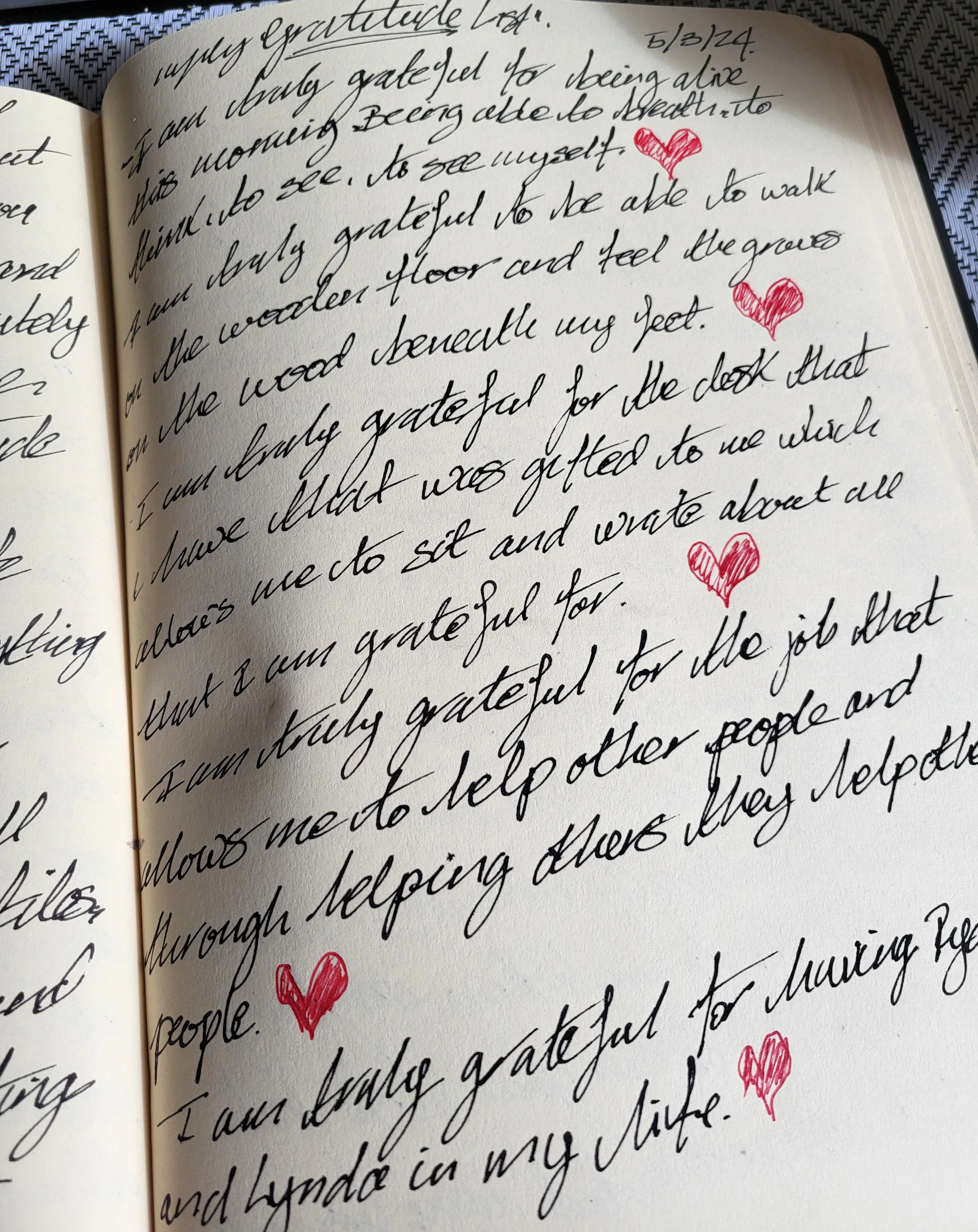 an open book with writing on it
