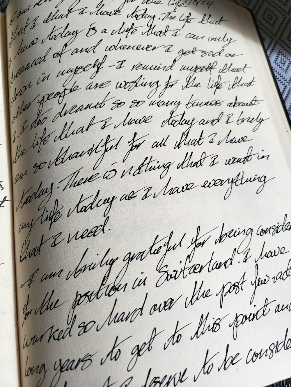 a close up of a book with writing on it