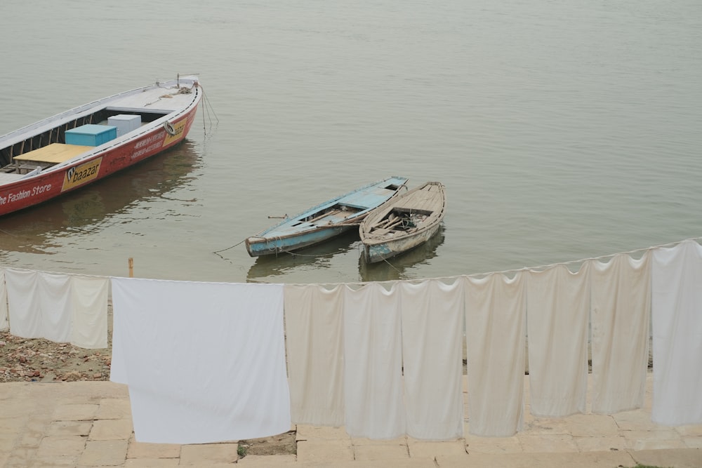 a couple of boats that are sitting in the water