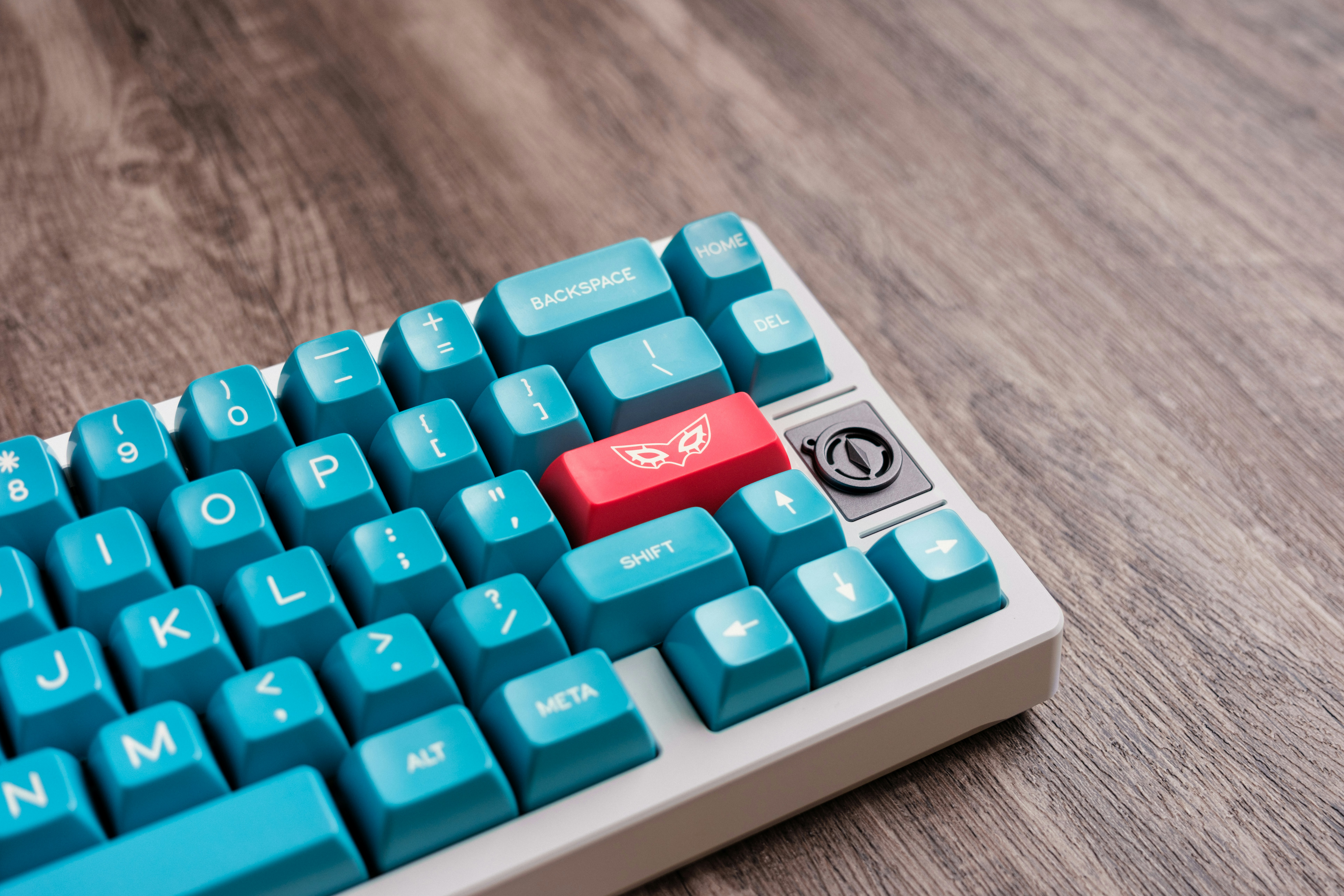 a close up of a blue computer keyboard
