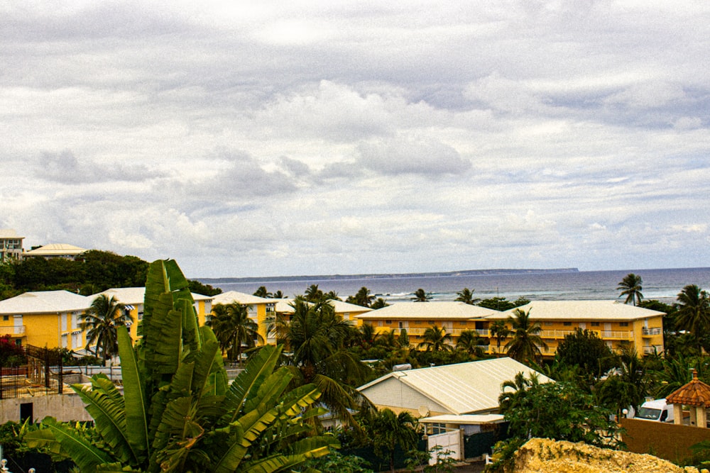 a view of a town with a beach in the background