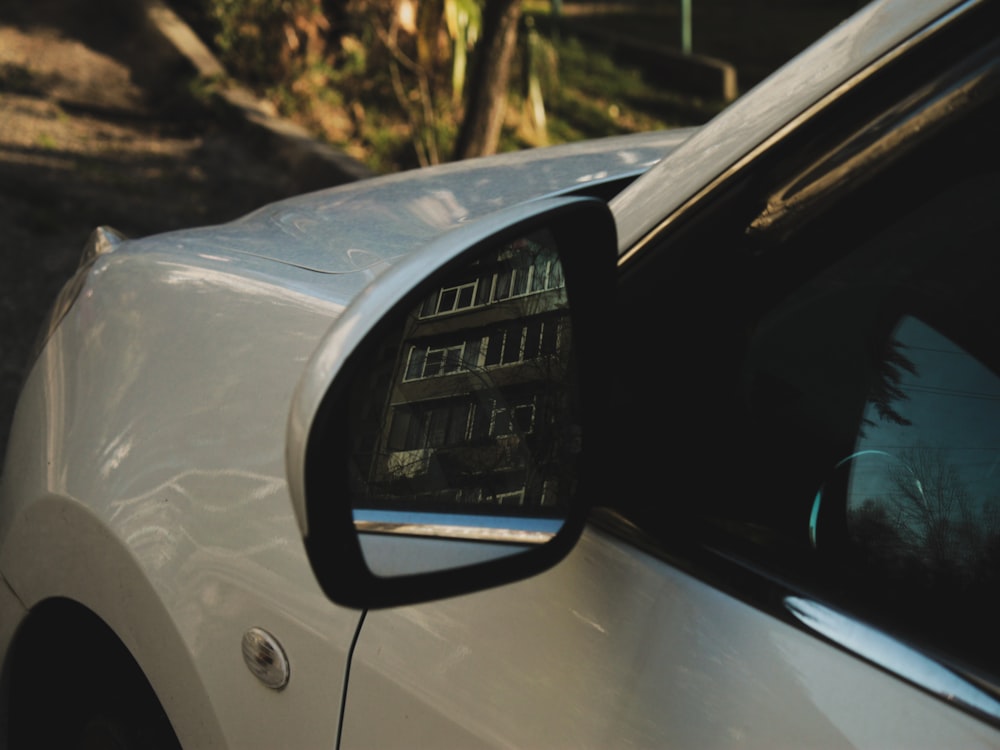 a close up of a car's rear view mirror