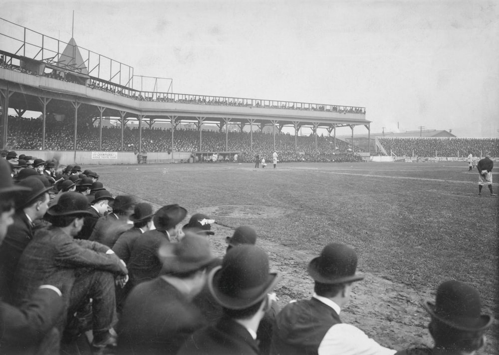 a crowd of people watching a baseball game