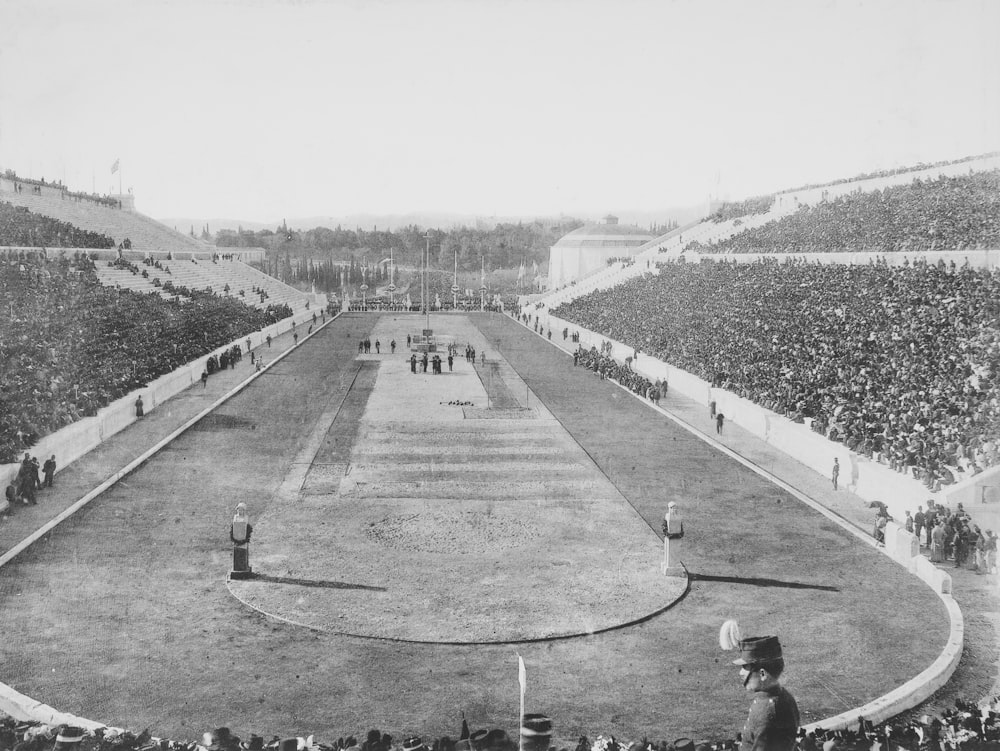 a crowd of people watching a baseball game