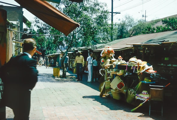 Vendor at market stall