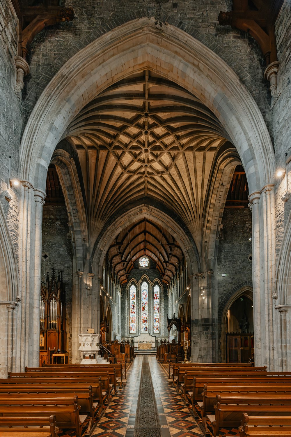 a church with pews and a checkered floor