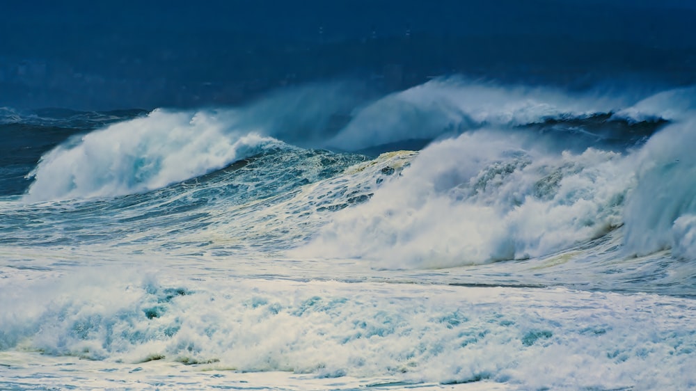 a painting of a large wave in the ocean