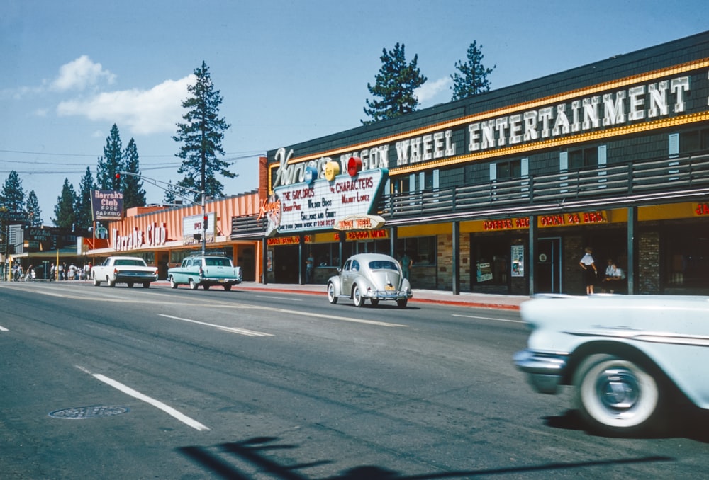 an old photo of a street in a small town