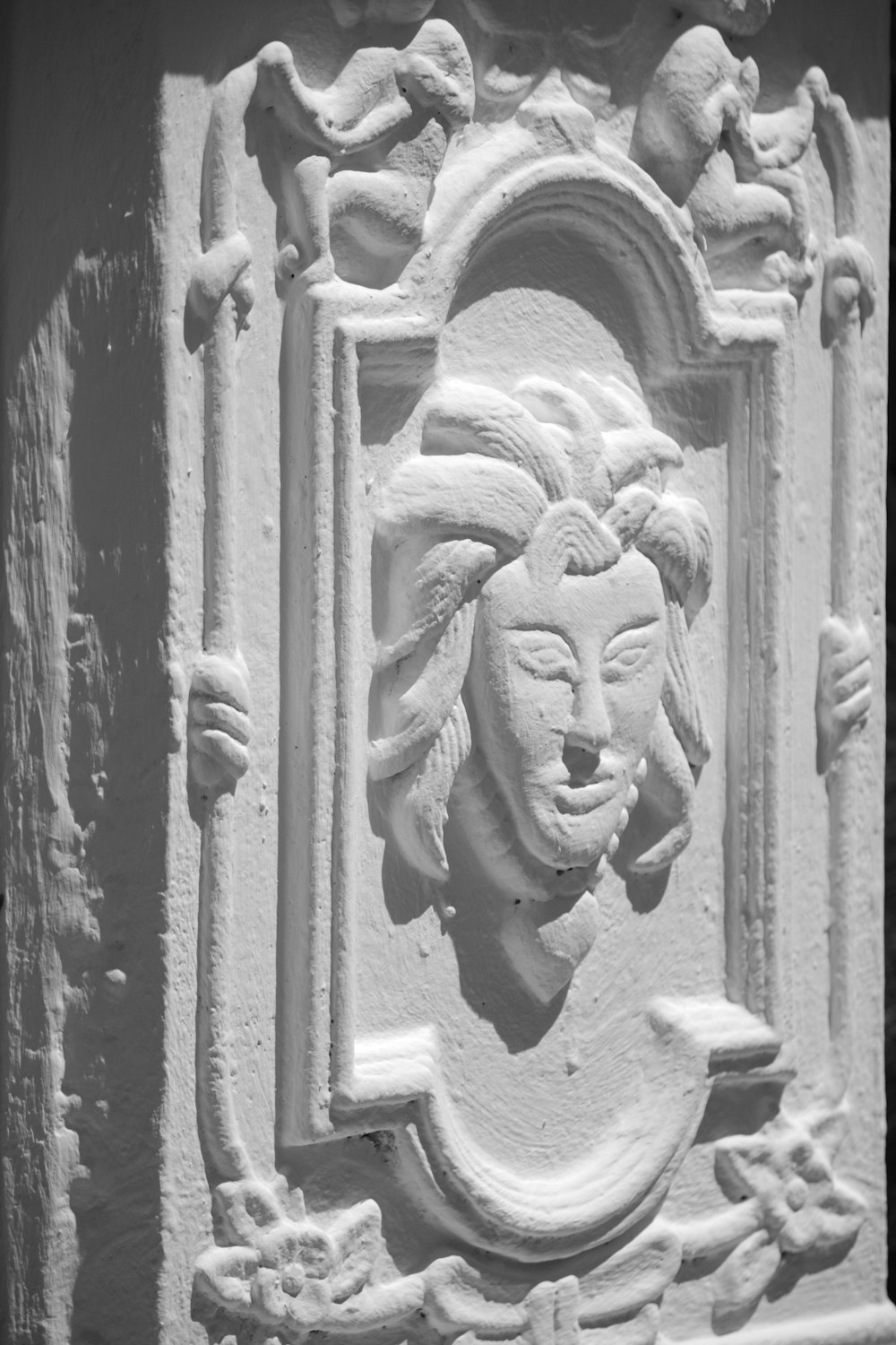 a carving on the side of a building