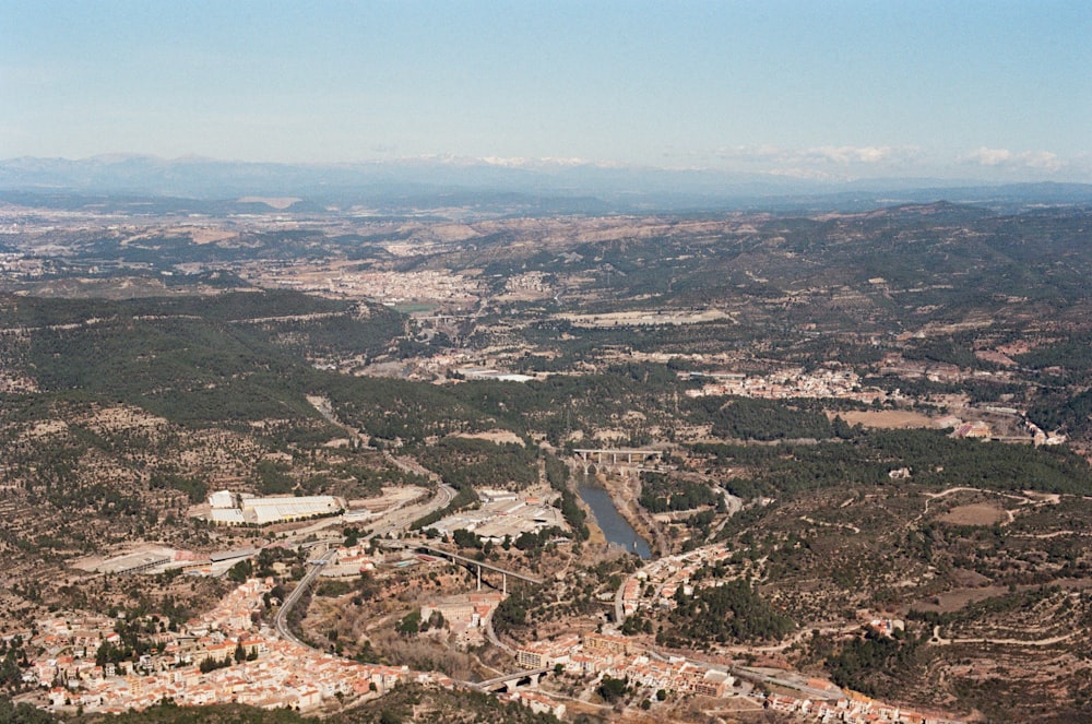 an aerial view of a city and a river