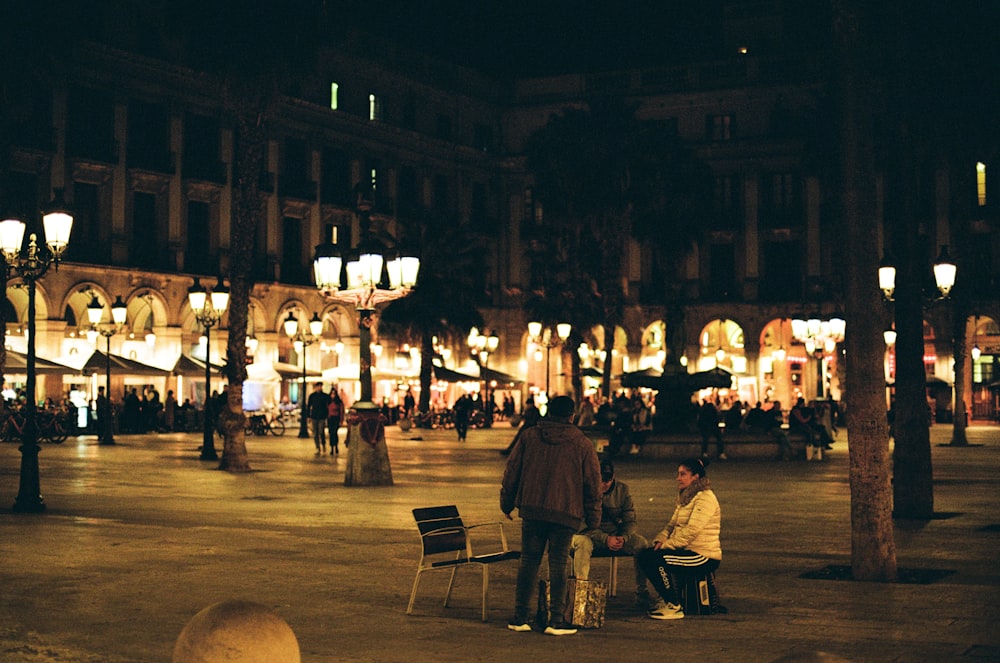 a couple of people that are sitting on some chairs