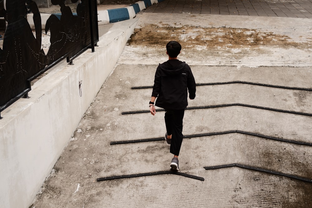 a person walking up a set of stairs