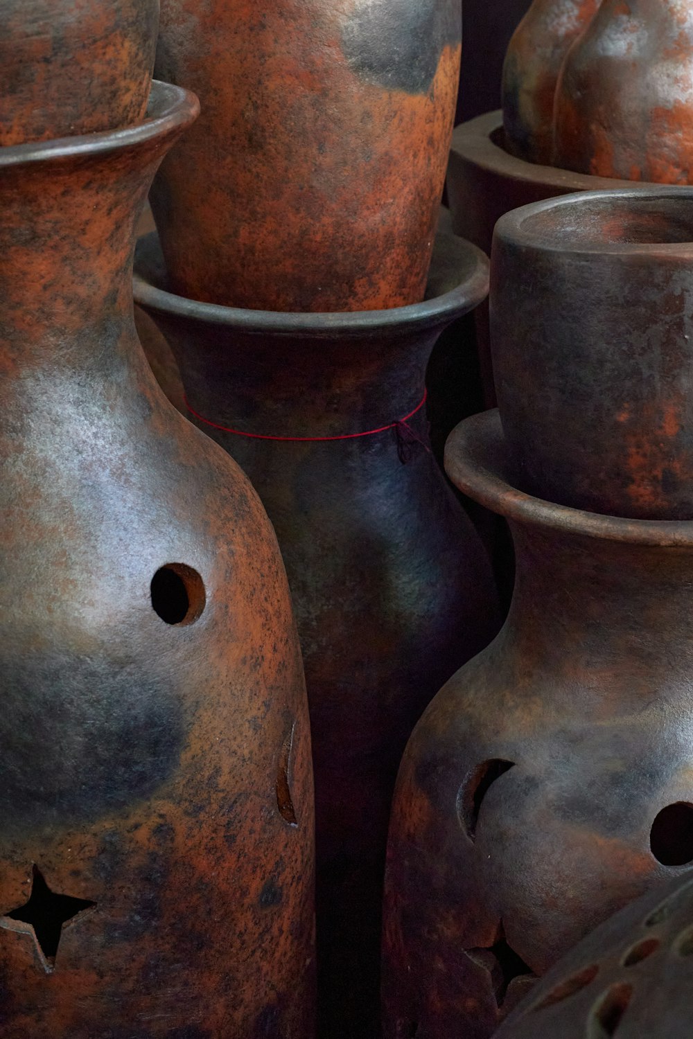 a group of vases sitting next to each other