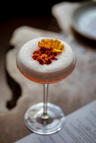 a small dessert with a flower on top of it