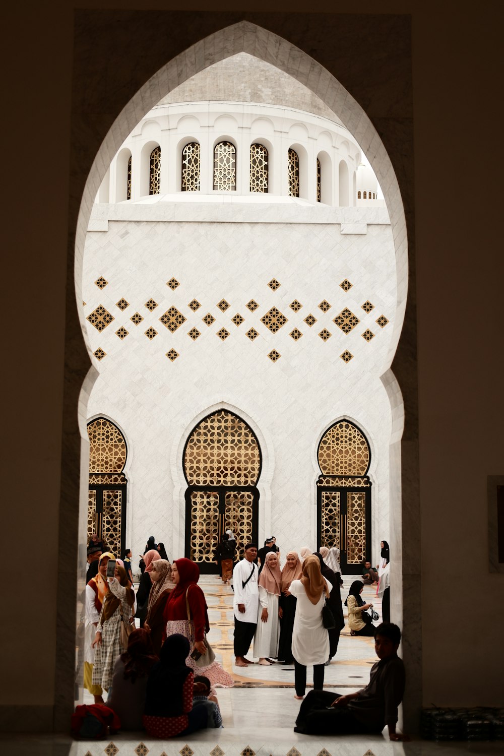 a group of people standing in front of a building