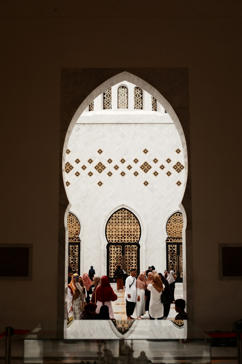 a group of people standing in front of a building