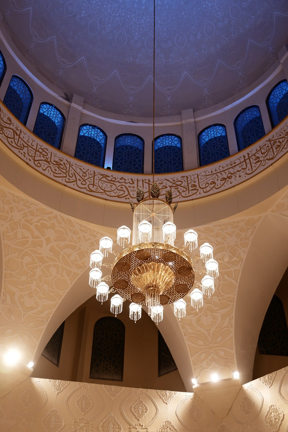 a chandelier hanging from the ceiling of a building