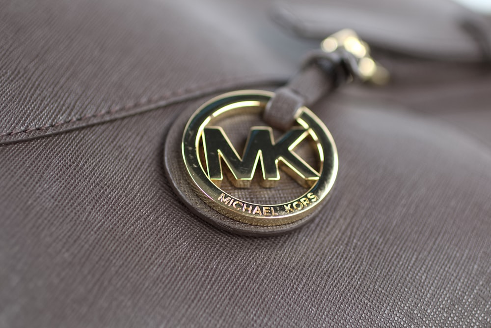 a close up of a michael kors bag