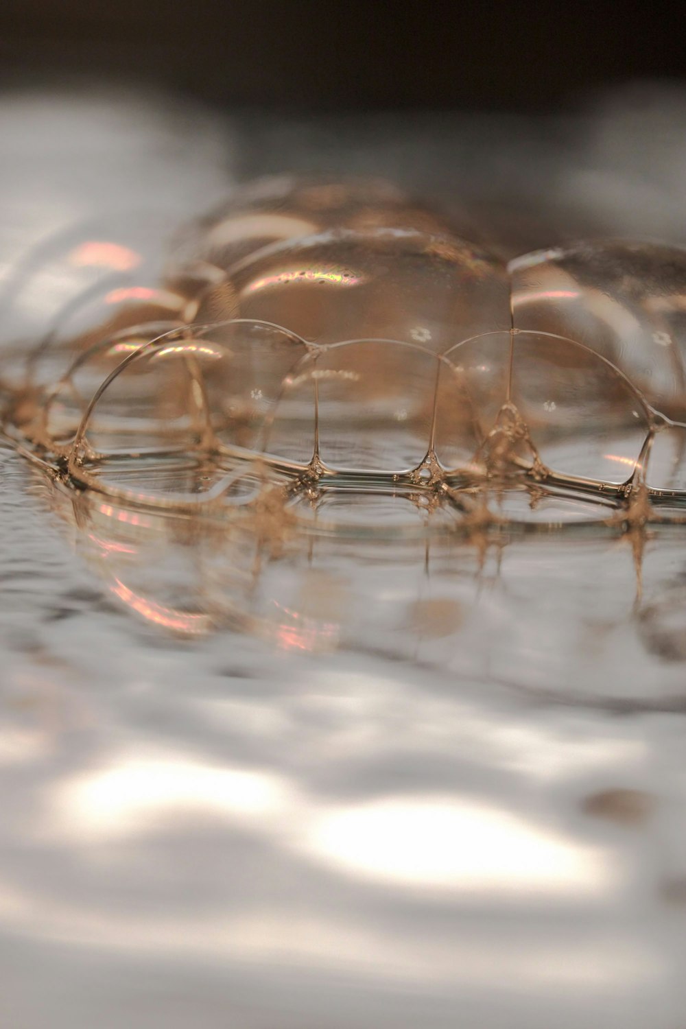 a close up of a water droplet on a surface