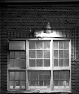 a black and white photo of a window