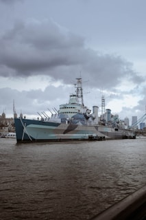 a large blue and white boat in the water