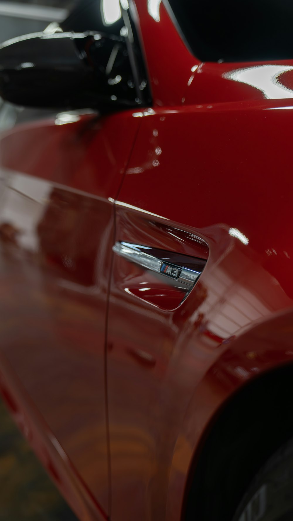 a close up of a red sports car