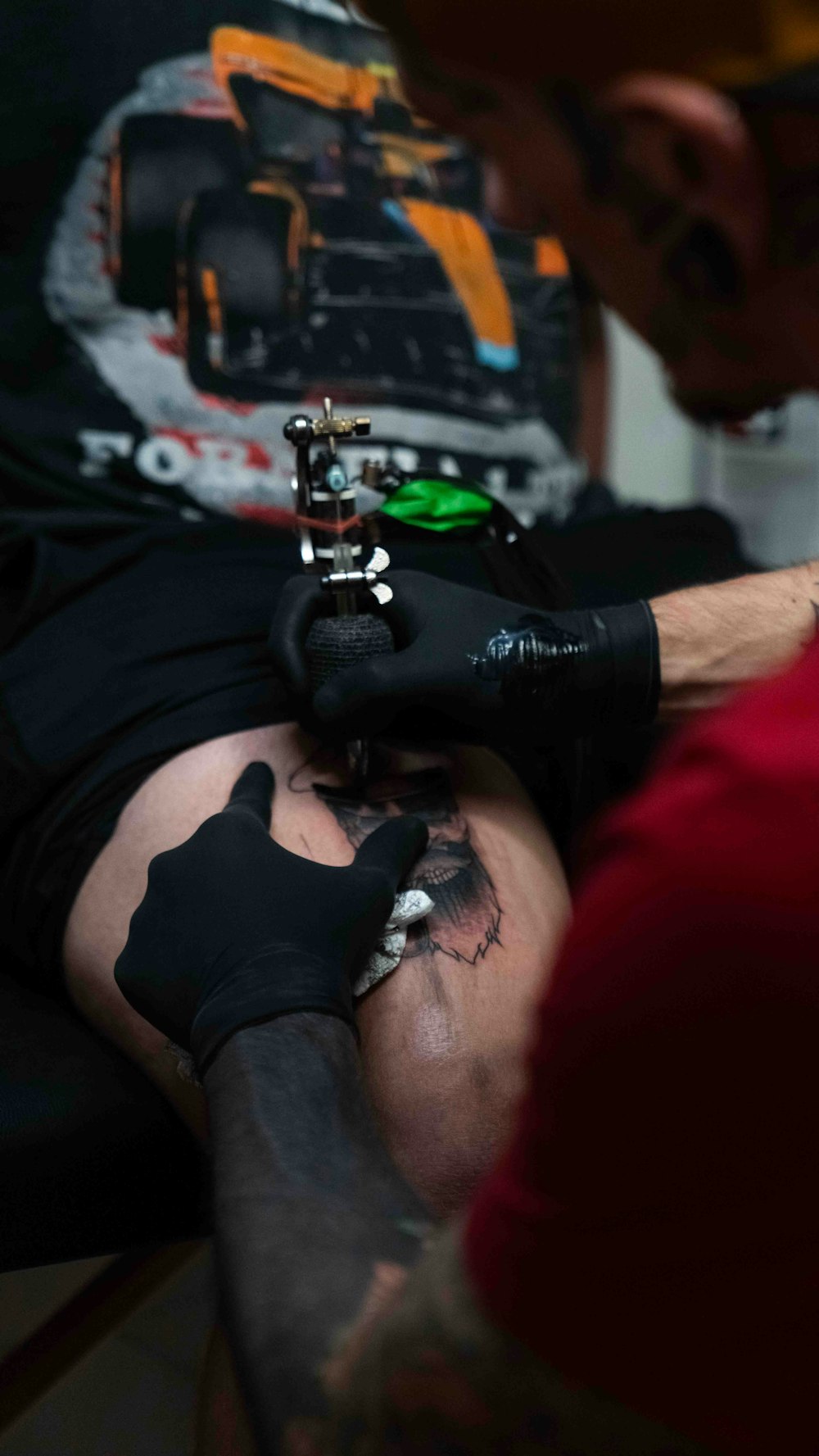 a man with a tattoo on his arm