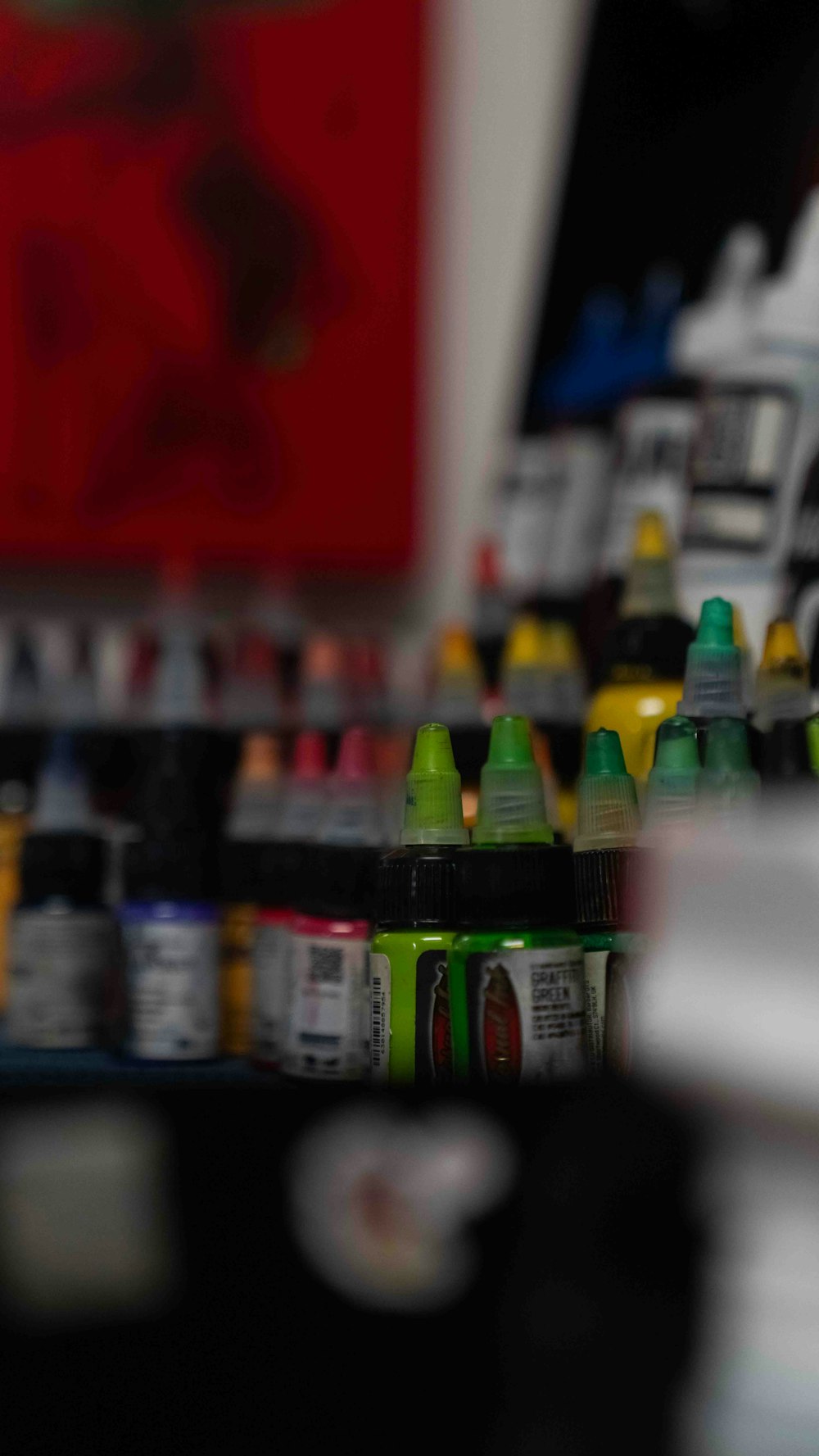 a close up of many different colors of paint