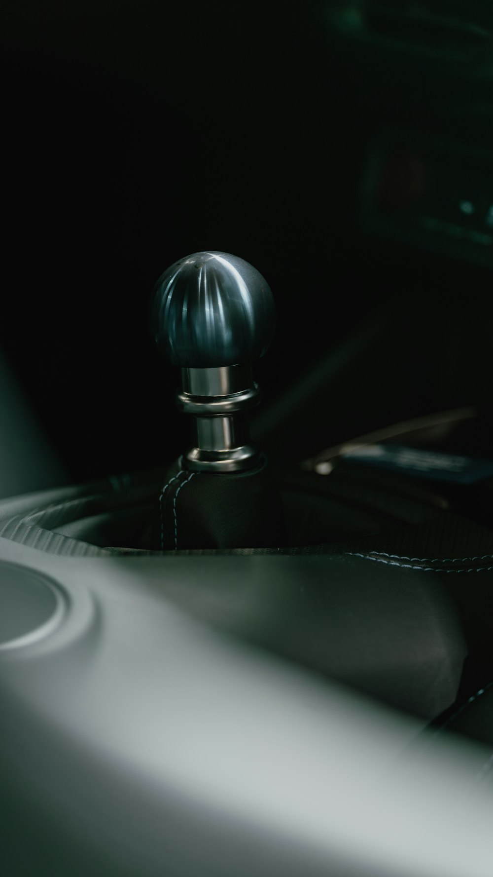 a close up of a steering wheel on a car