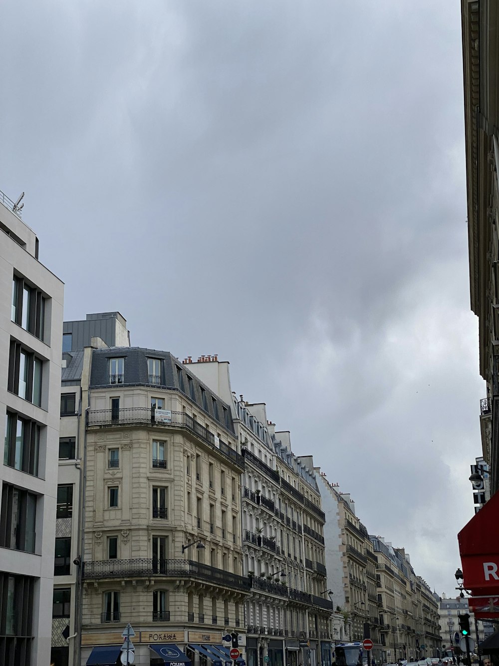 a city street filled with lots of tall buildings