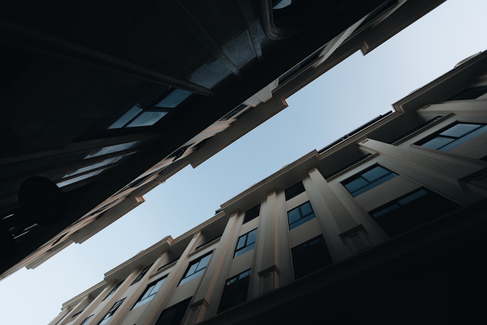 looking up at a tall building from below