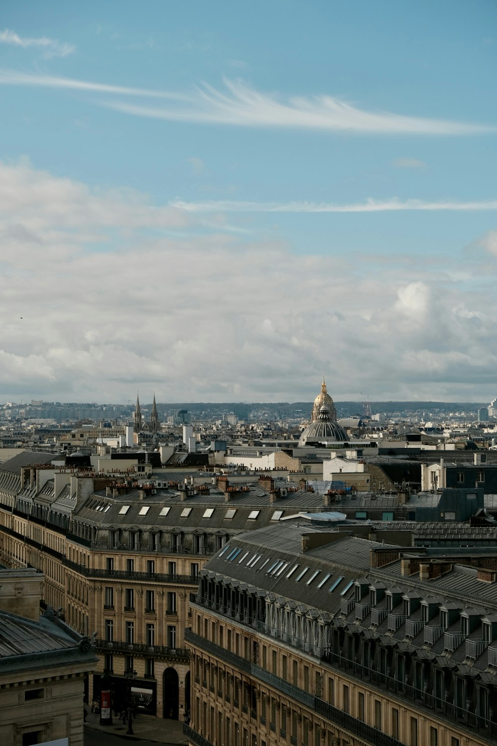 a view of a city from the top of a building