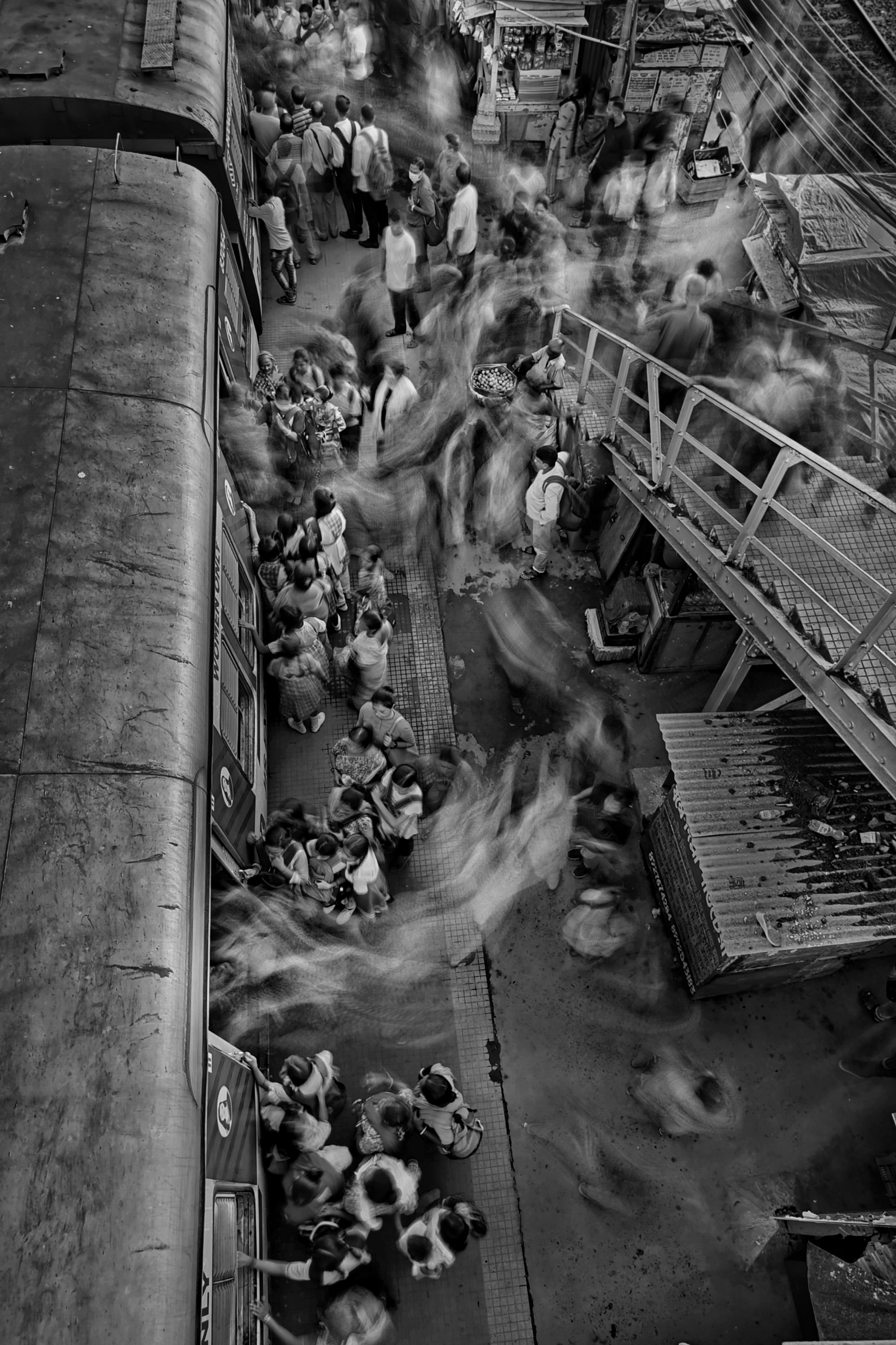 a black and white photo of a crowd of people