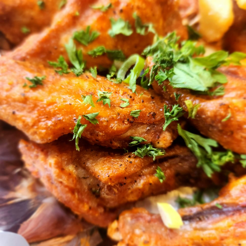 a close up of a plate of food with meat