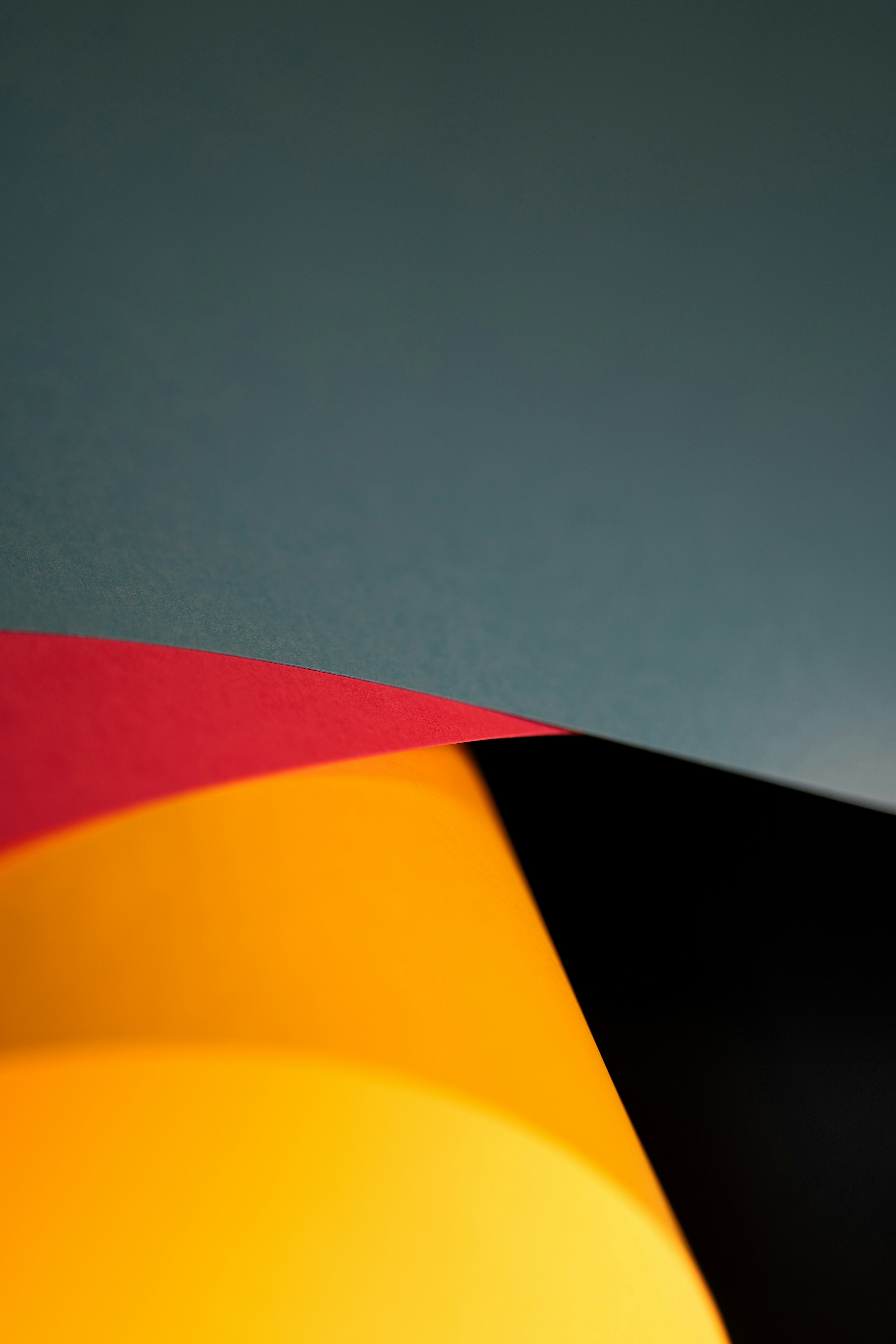 a black, yellow, and red umbrella is shown