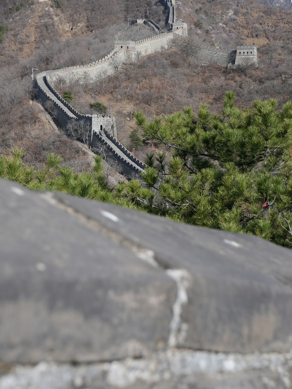 a man riding a skateboard down a steep hill