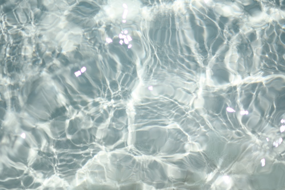 a close up of a pool with clear water