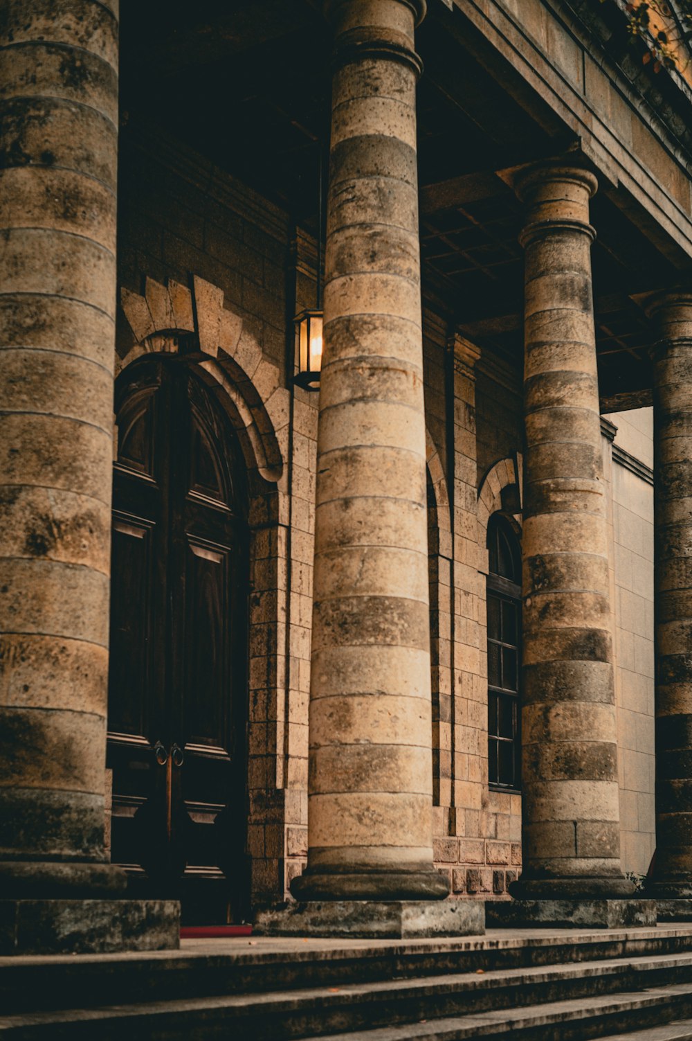 a couple of stone pillars sitting next to each other