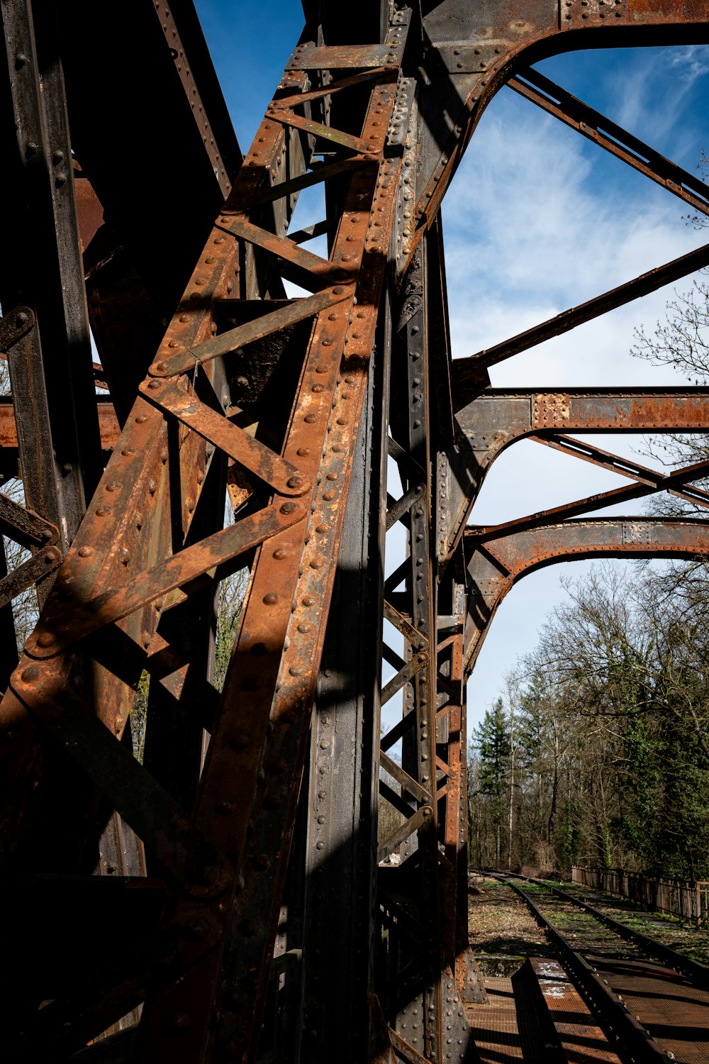 a train bridge with a train going over it