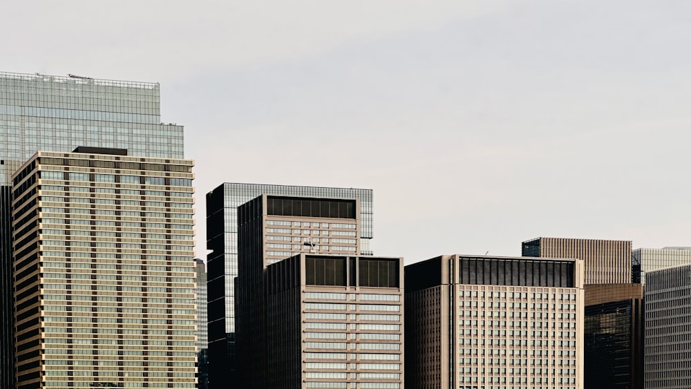 a group of tall buildings sitting next to each other