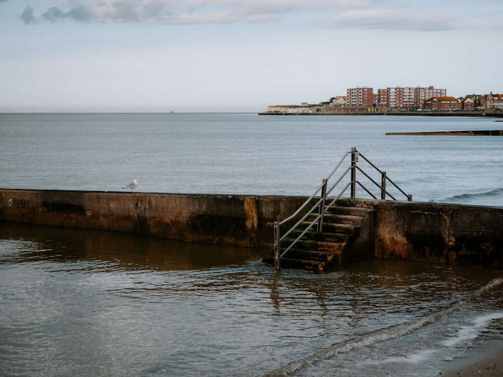 a set of stairs leading to the beach