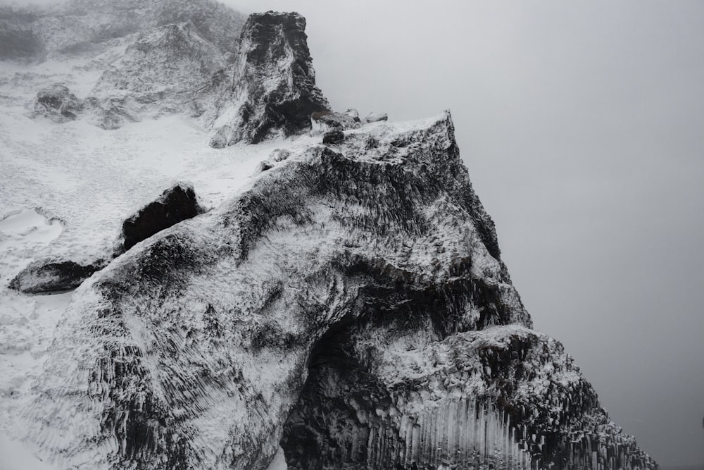 a very tall mountain covered in snow and ice