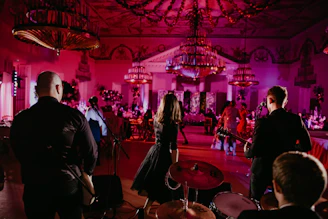 a group of people standing in a room