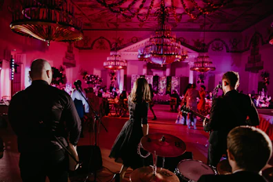 a group of people standing in a room