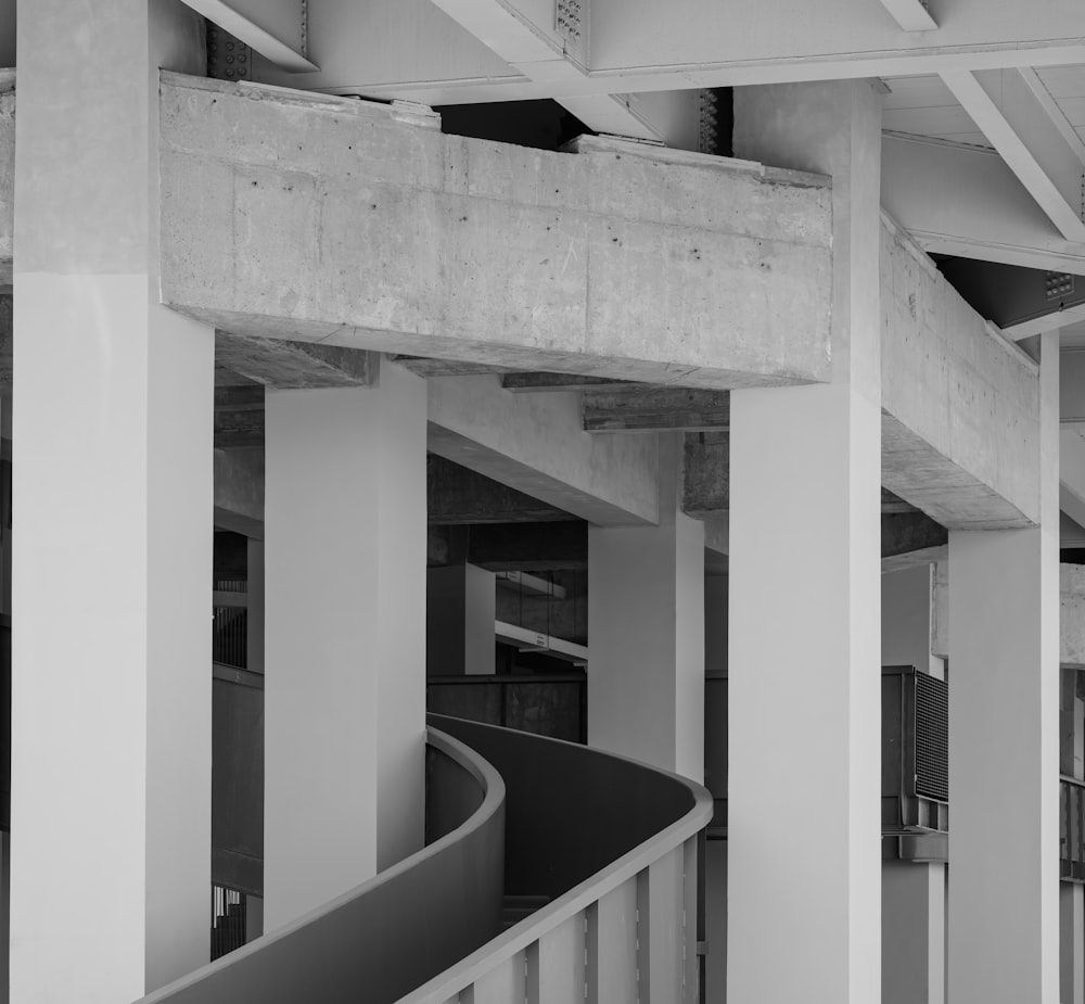 a black and white photo of a staircase in a building