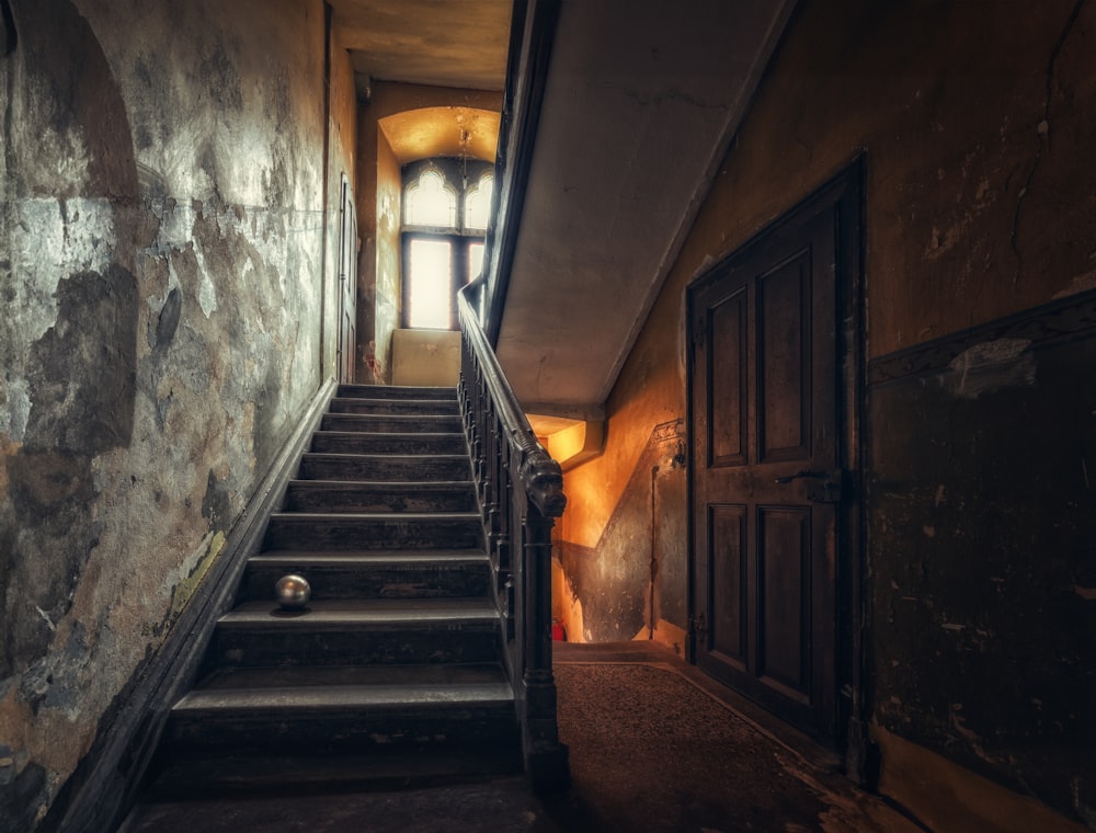 a set of stairs leading up to a window