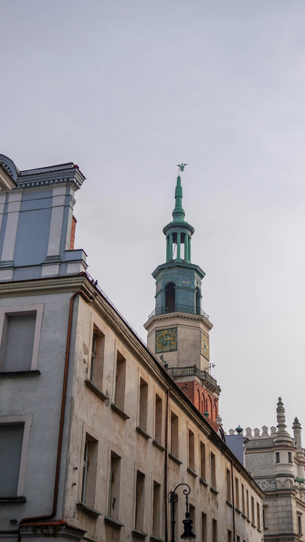 a tall building with a clock on the top of it