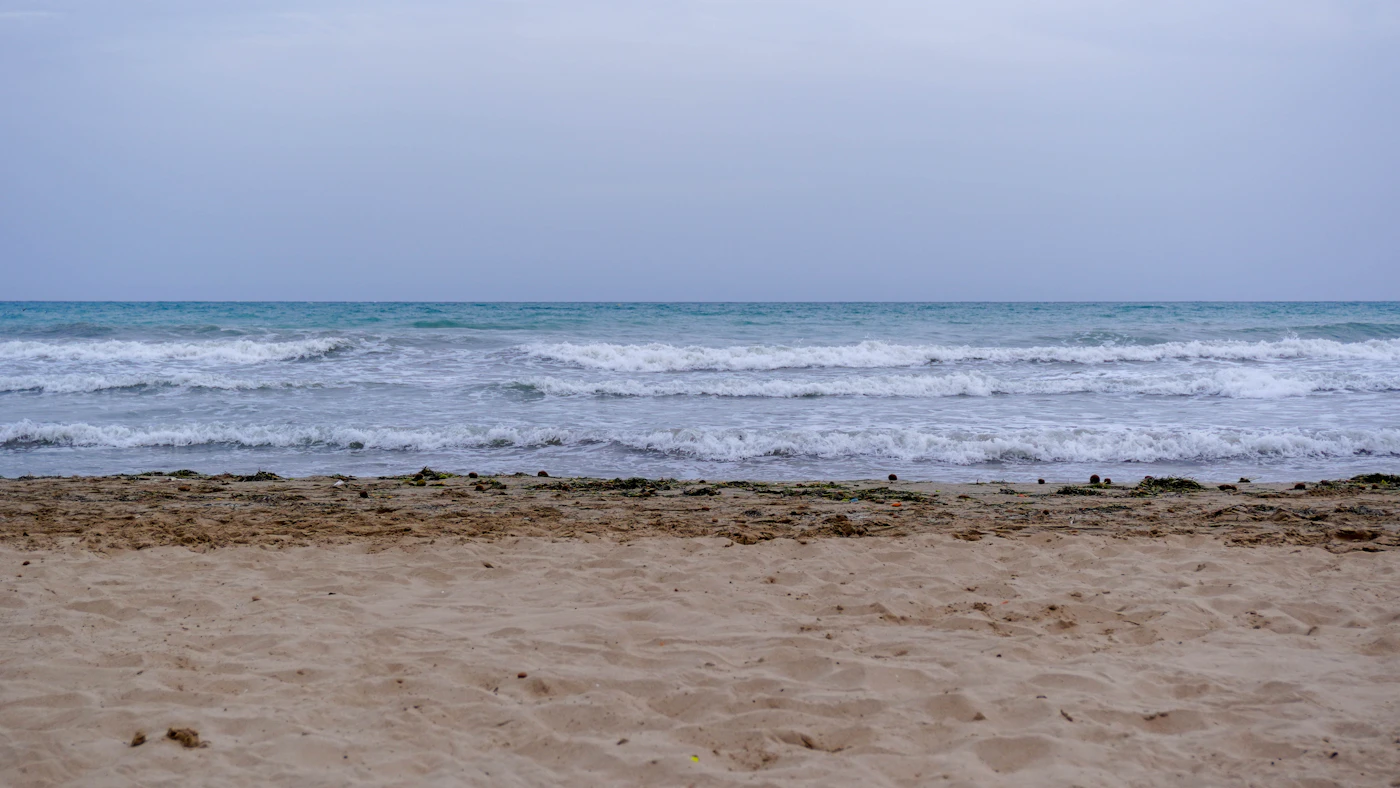 Alicante Mediterranean beach and sea from the coast image from Unsplash