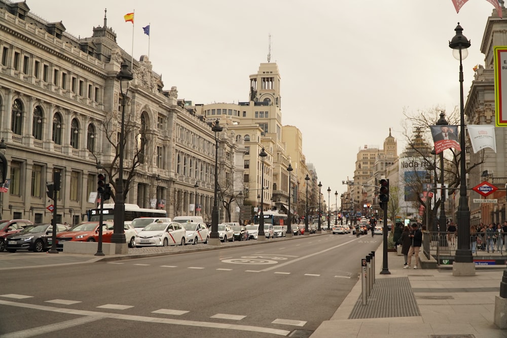 a city street filled with lots of tall buildings