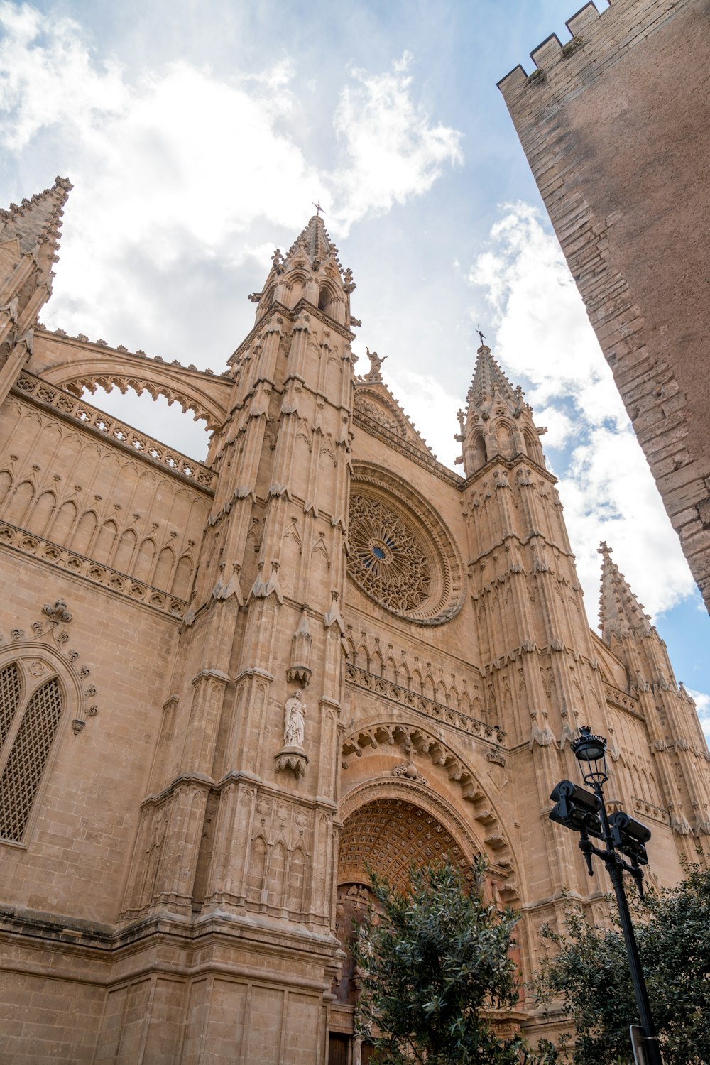 a large cathedral with a clock on the front of it